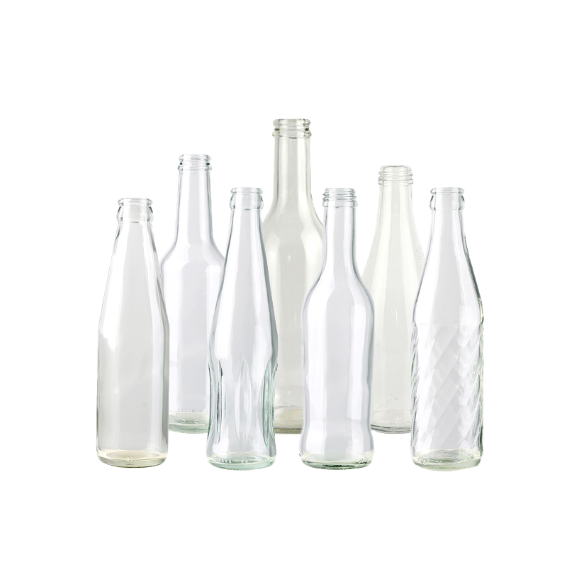 Why does cola in glass bottles taste better than in cans or plastic